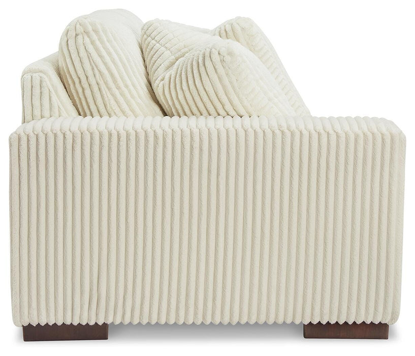 Lindyn Sectional with Chaise - Eclectic 79 Furniture Store