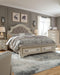 Realyn Upholstered Bed - Eclectic 79 Furniture Store