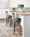 Caitbrook Bar Height Bar Stool - Eclectic 79 Furniture Store