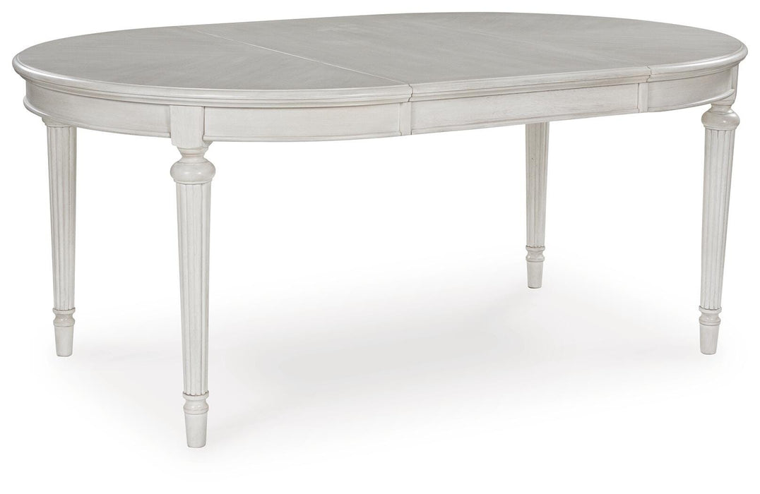 Montelaine Dining Extension Table - Eclectic 79 Furniture Store