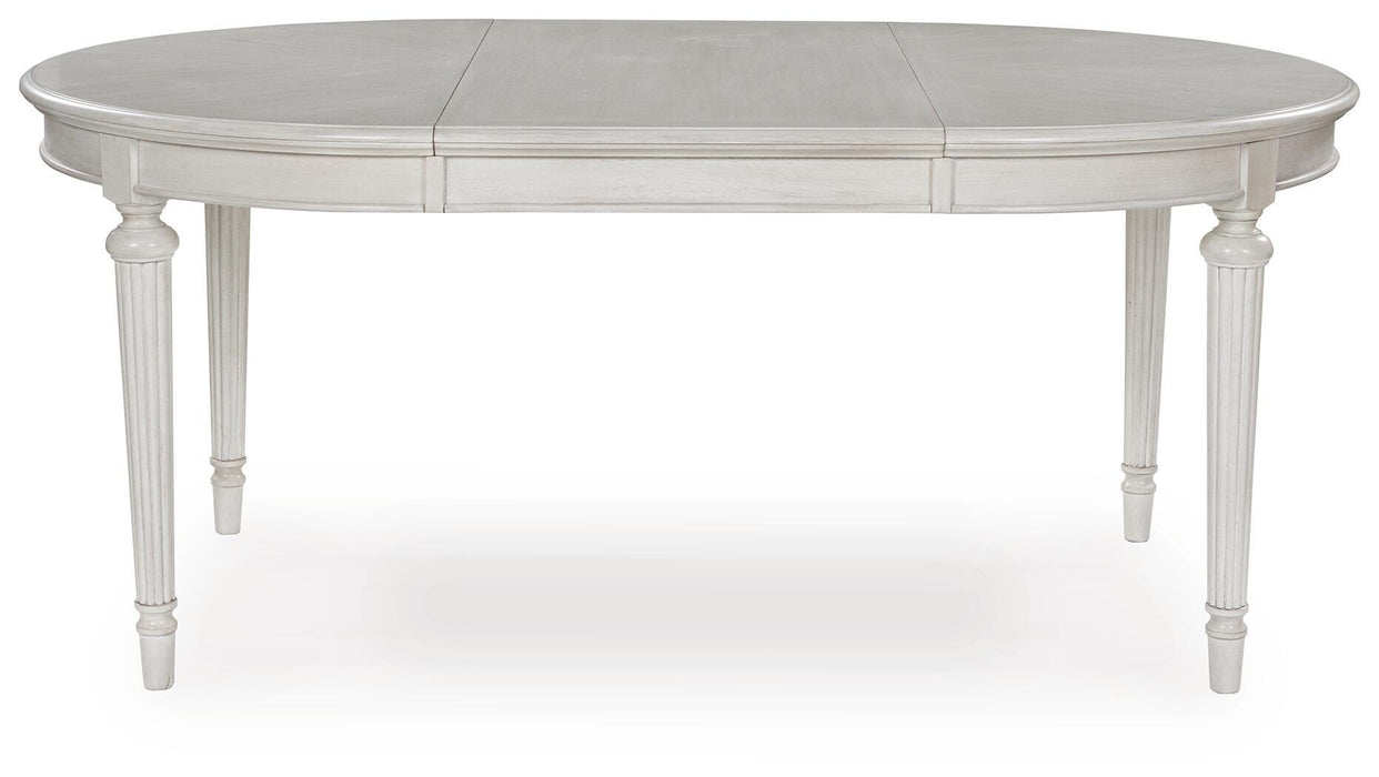 Montelaine Dining Extension Table - Eclectic 79 Furniture Store