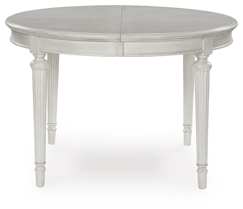 Montelaine Dining Extension Table - Eclectic 79 Furniture Store