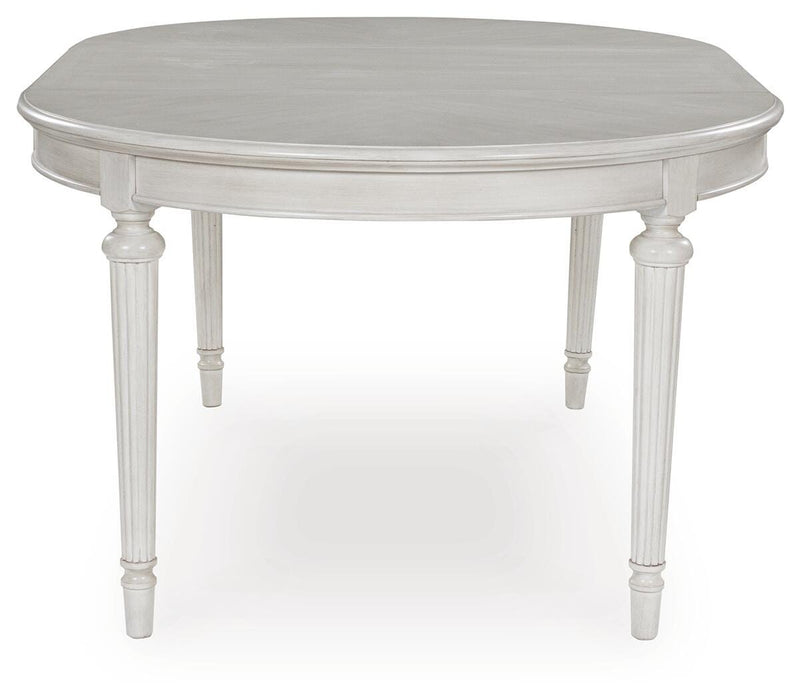 Montelaine Dining Extension Table - Eclectic 79 Furniture Store