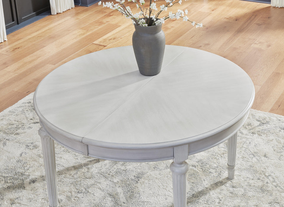 Montelaine Dining Extension Table - Eclectic 79 Furniture Store